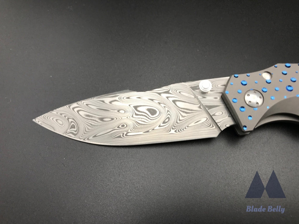 Jason Guthrie Scout - Damasteel Harpoon Drop Point W/ Blue Raindrop Milled Handles (Blade 2019)