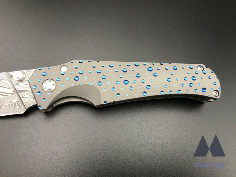 Jason Guthrie Scout - Damasteel Harpoon Drop Point W/ Blue Raindrop Milled Handles (Blade 2019)