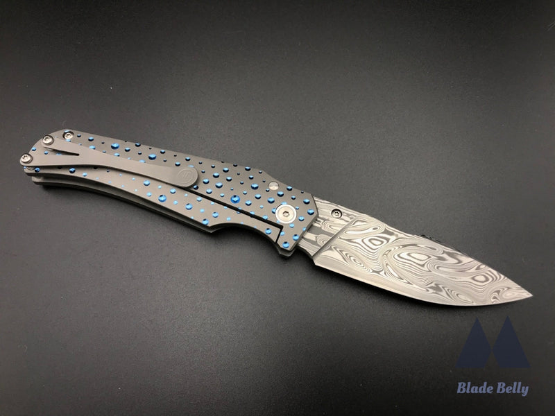 Jason Guthrie Scout - Damasteel Harpoon Drop Point W/ Blue Raindrop Milled Handles (Blade 2019)