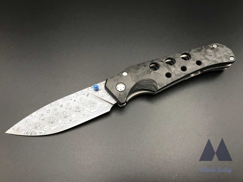 Jg Scout - Damasteel Drop Point And Marbled Carbon Fiber