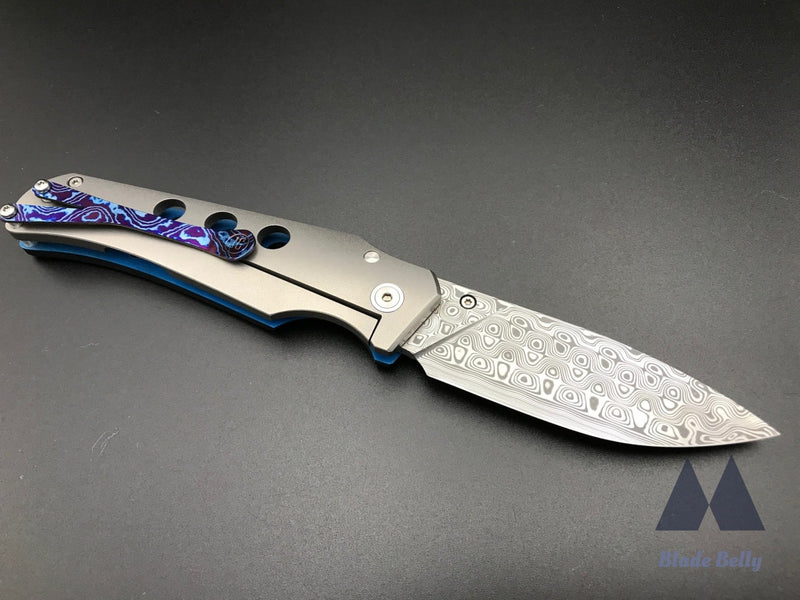 Jg Scout - Damasteel Drop Point And Marbled Carbon Fiber