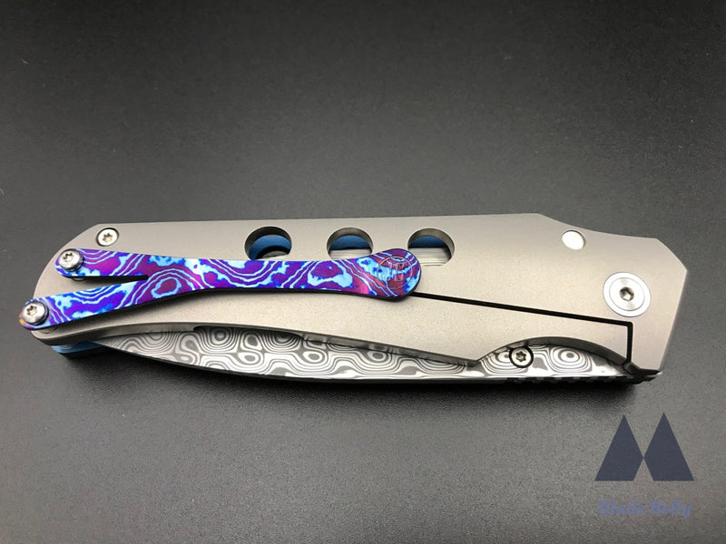 Jg Scout - Damasteel Drop Point And Marbled Carbon Fiber