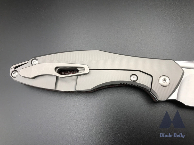 Koenig Arius - Flipper Delete Burnished Drop Point And Red Twill Carbon Fiber