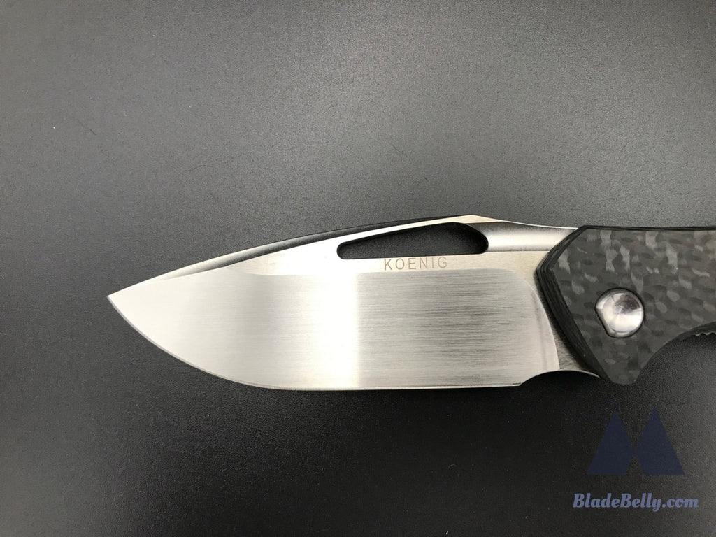 Koenig Arius - Hand Rub Drop Point Black Carbon Fiber And Blue Anodized Hardware