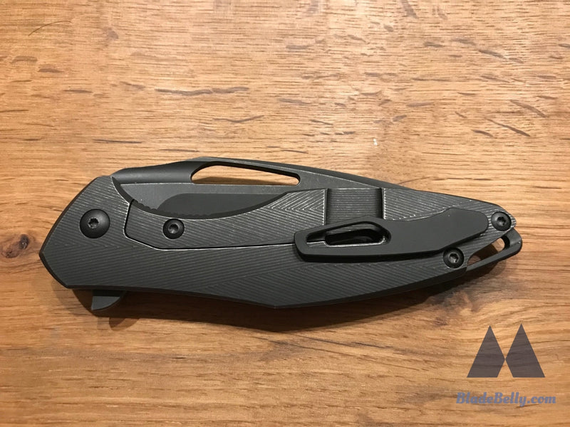 Koenig Arius - Tumbled Dlc Drop Point Black Textured Micarta And Hardware